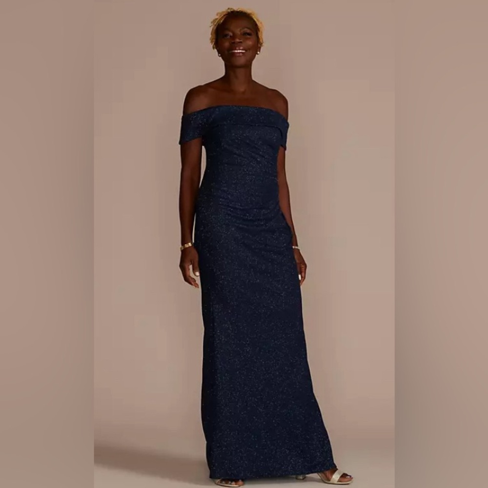 OLEG CASSINI David’s Bridal
Off the-shoulder draped glitter knit sheath